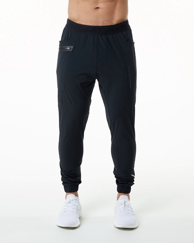 Alphalete Woven 4-Way Stretch 29" Pant Czarne | 78064-JSDX