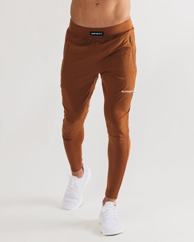 Alphalete Woven 4-Way Stretch 29" Pant Spice | 53418-PNVE