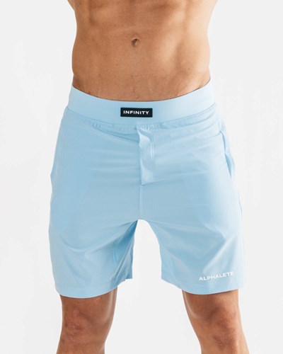 Alphalete Woven 4-Way Stretch 7" Krótkie Niebieskie | 78149-VKEW