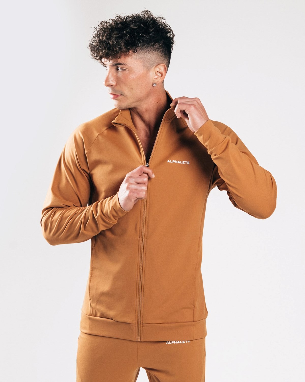 Alphalete 4-Way Stretch Track Jacket Camel | 36105-UHGW