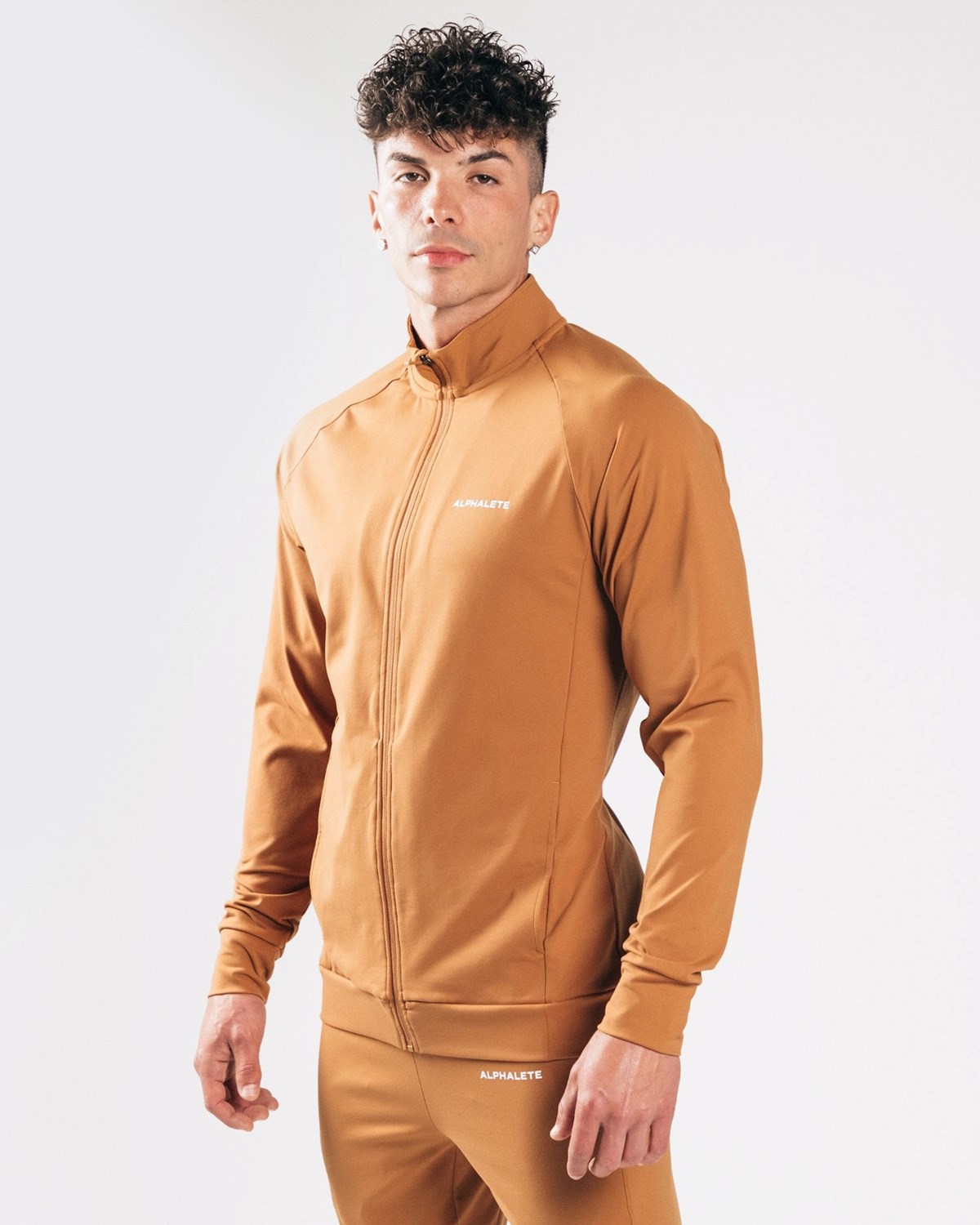 Alphalete 4-Way Stretch Track Jacket Camel | 36105-UHGW