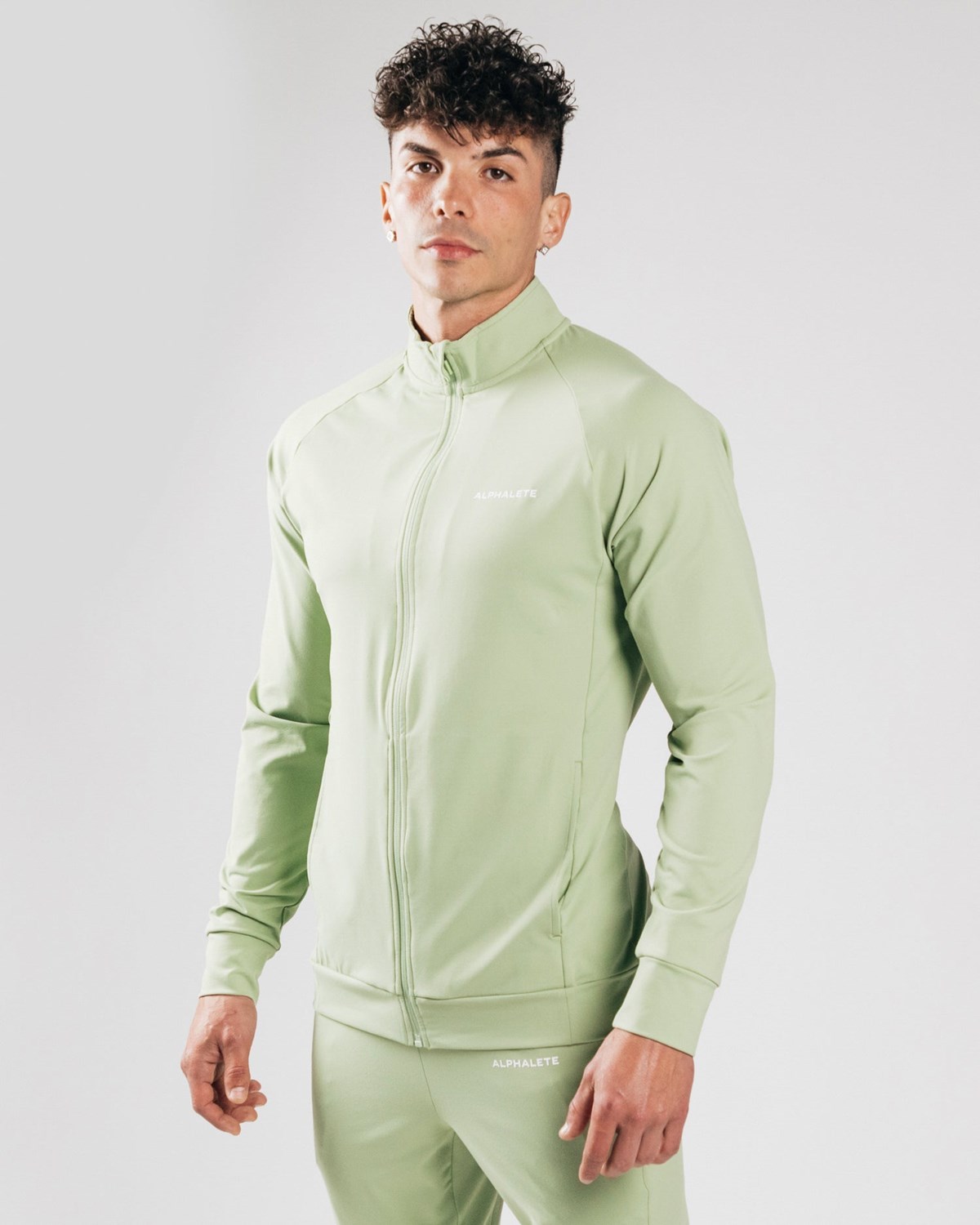 Alphalete 4-Way Stretch Track Jacket Frozen Spring | 49573-ZBSF