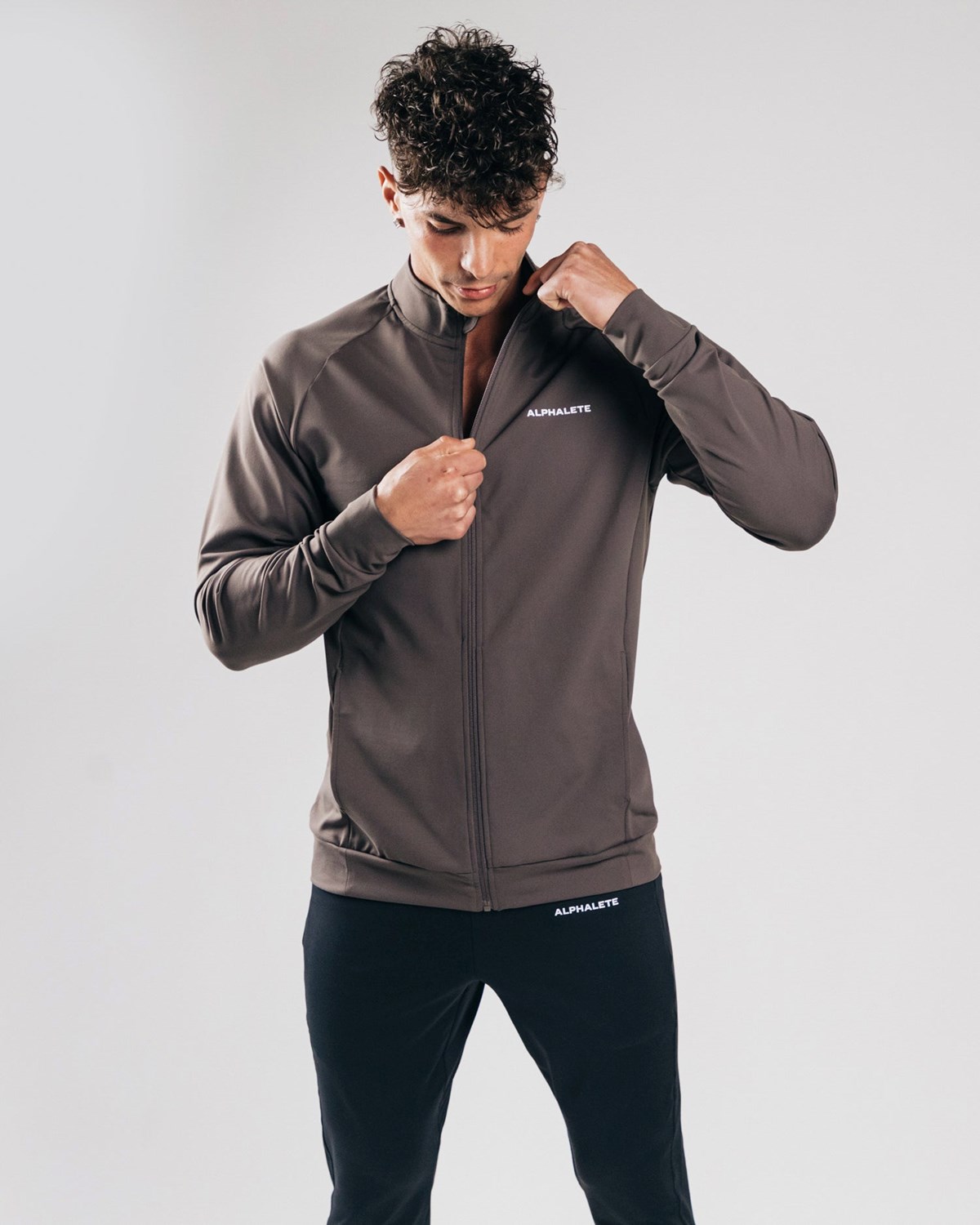 Alphalete 4-Way Stretch Track Jacket Striker | 95406-XYSV