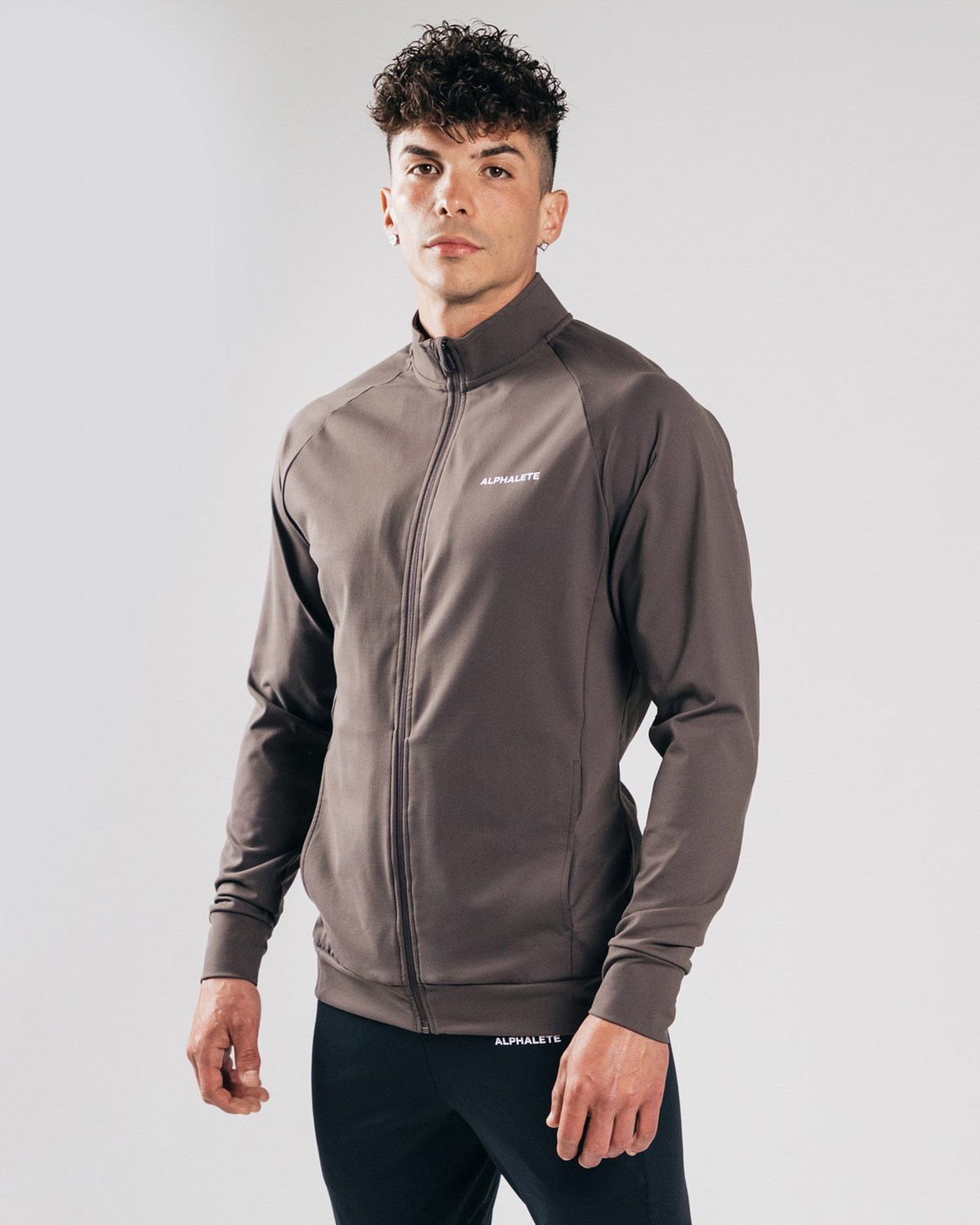 Alphalete 4-Way Stretch Track Jacket Striker | 95406-XYSV